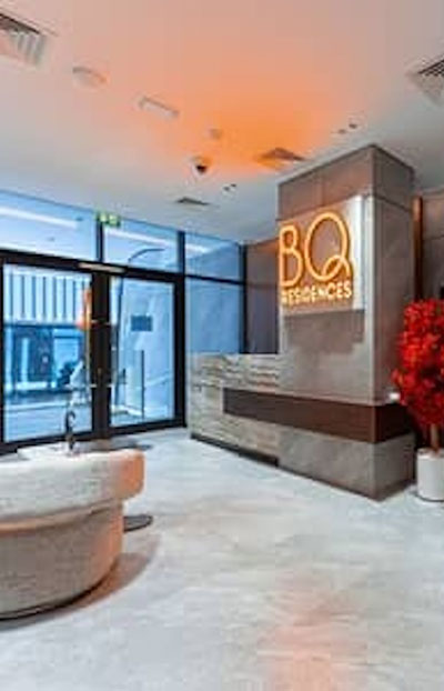 Modern reception area at BQ Residences near Urban Panda Hostel DWTC